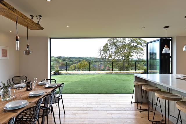 Bifold Doors from the kitchen open to a balcony Bifold Doors from the kitchen open to a balcony