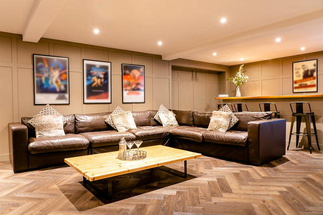 Leather seats and bar area in the games room Leather seats and bar area in the games room