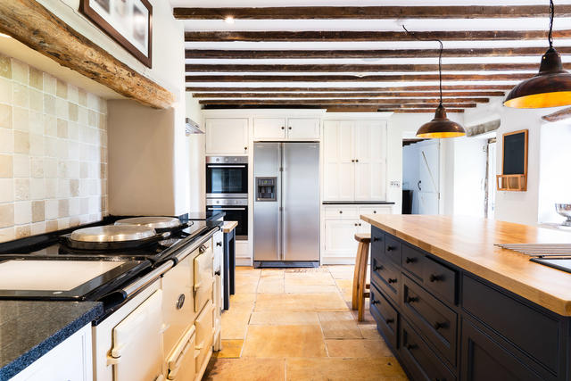 Kitchen with Aga and central island details Kitchen with Aga and central island details