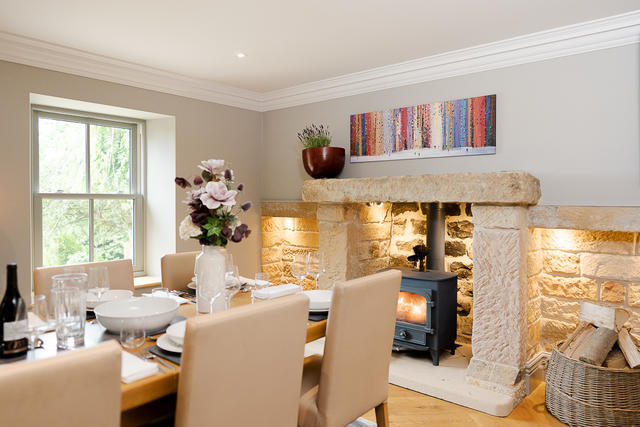 Striking Stone Fireplace in the Dining Area